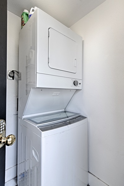 Stacked washer and dryer in an in-unit laundry closet
